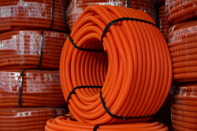 Imagen de rollo de manguera corrugada naranja